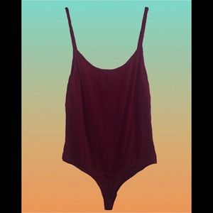 Dark maroon body suit